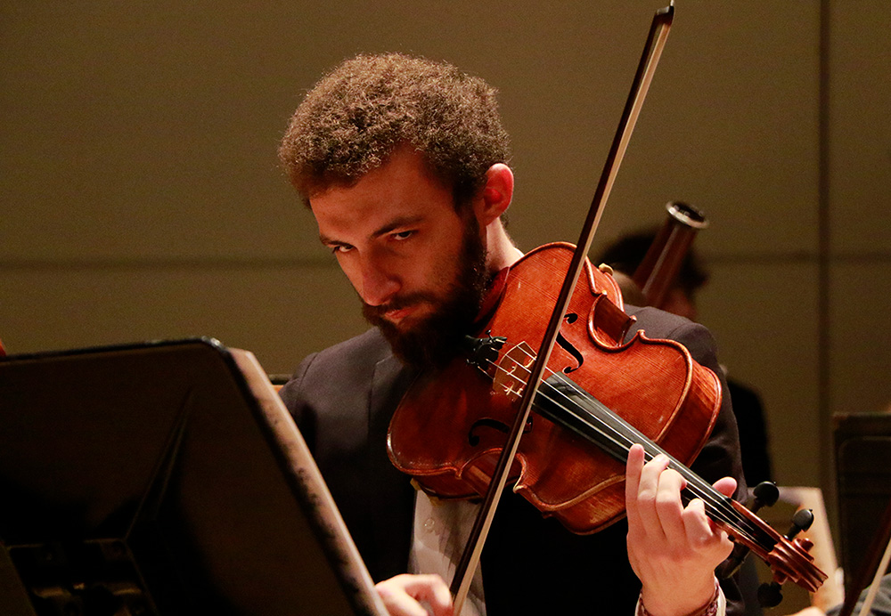 student playing viola