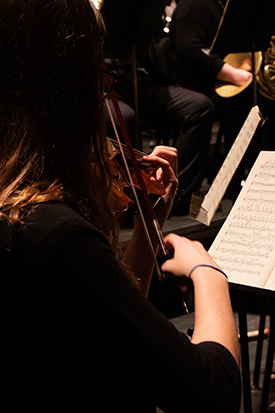 Student playing violin