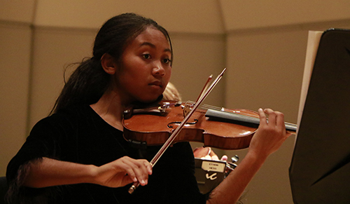 Female student playing violin
