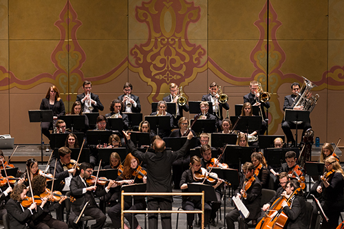 Orchestra on stage performing