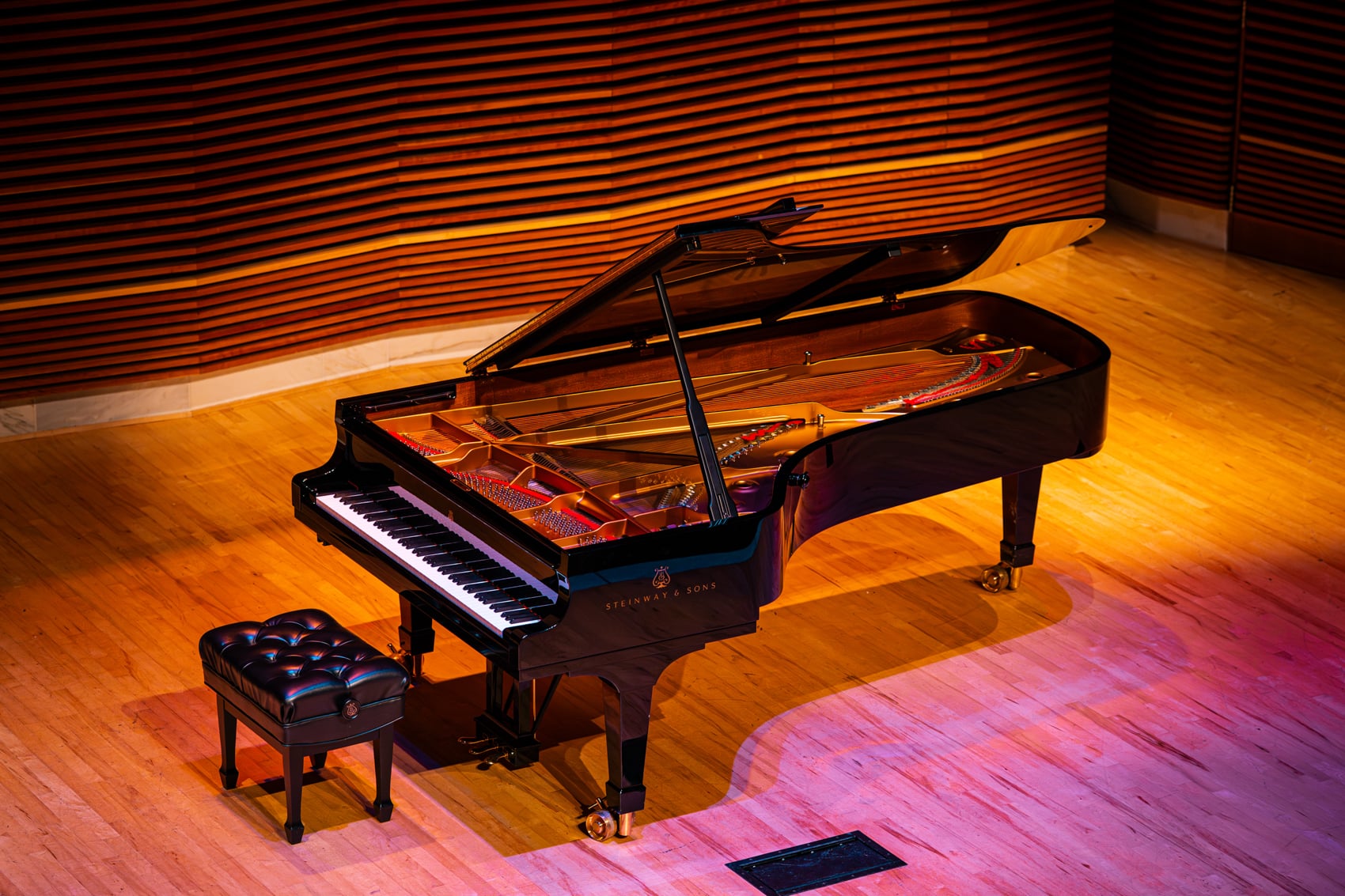 Photo of steinway piano on stage