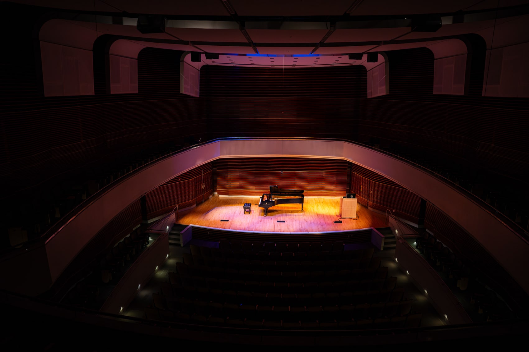 Photo of Powell Recital Hall. Piano on stage